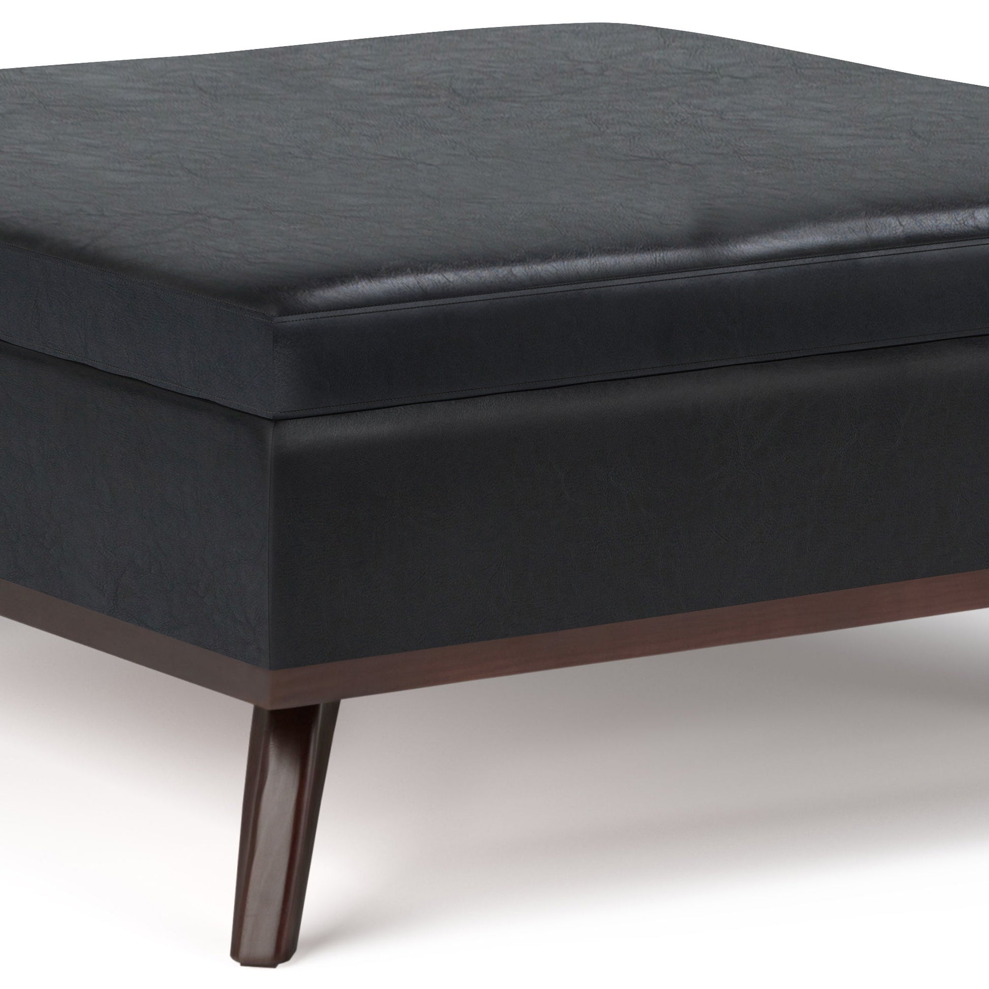 Close-up of the Owen Multifunctional Square Coffee Table Storage Ottoman, featuring a sleek black cushioned top, wooden legs, and a dark wood base with minimalist design, set against a white background.