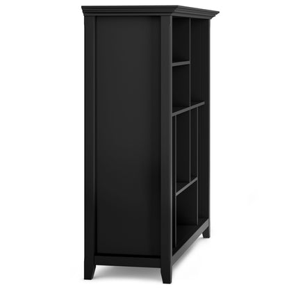 The Amherst - Multi Cube Bookcase And Storage Unit is shown in black wood with six open square compartments and a modern, simple design. The angled side view highlights its clean lines against a white background.