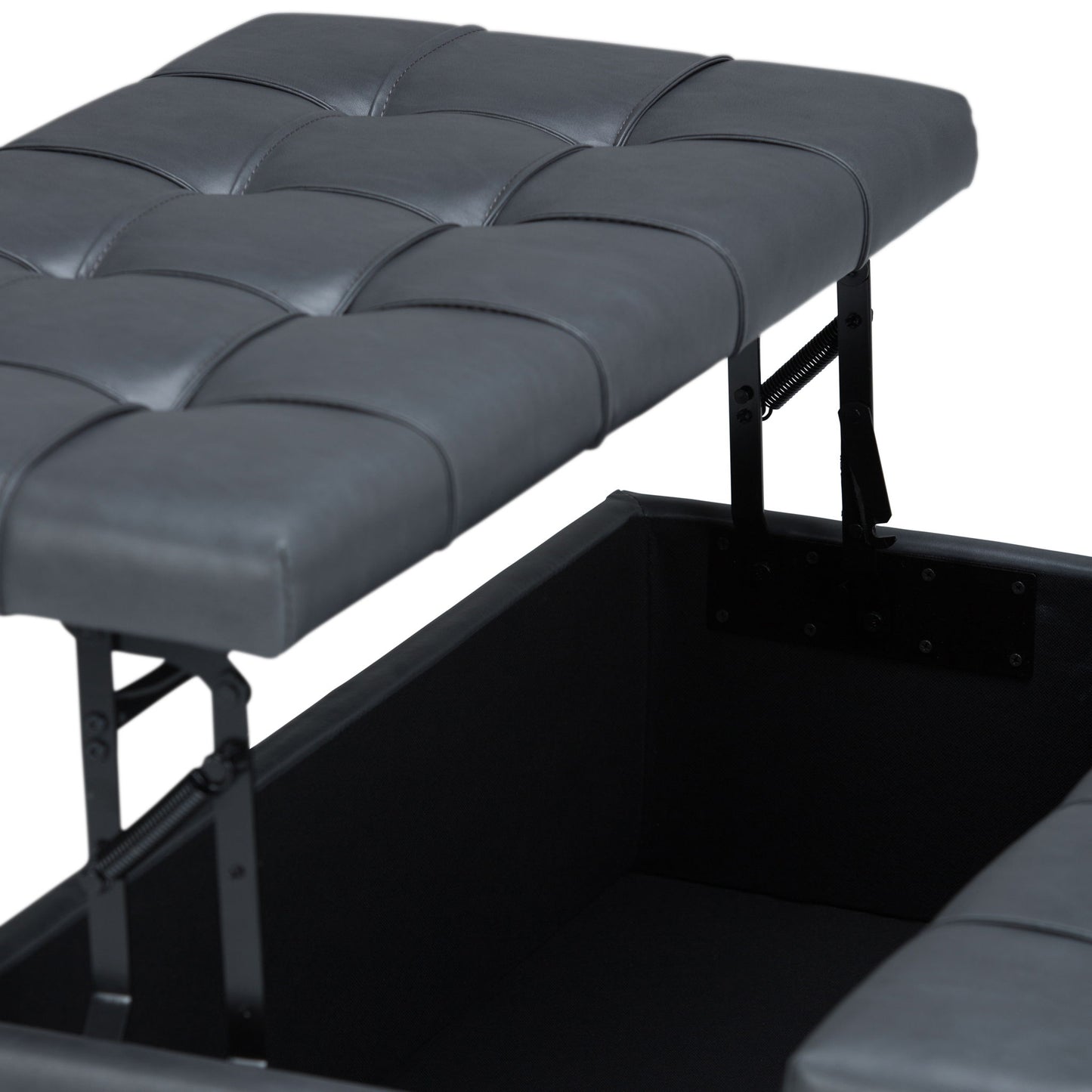 A close-up of the Harrison - Upholstered Coffee Table Storage Ottoman in tufted dark gray faux leather, with its hinged lid partially open to reveal a spacious storage compartment inside.