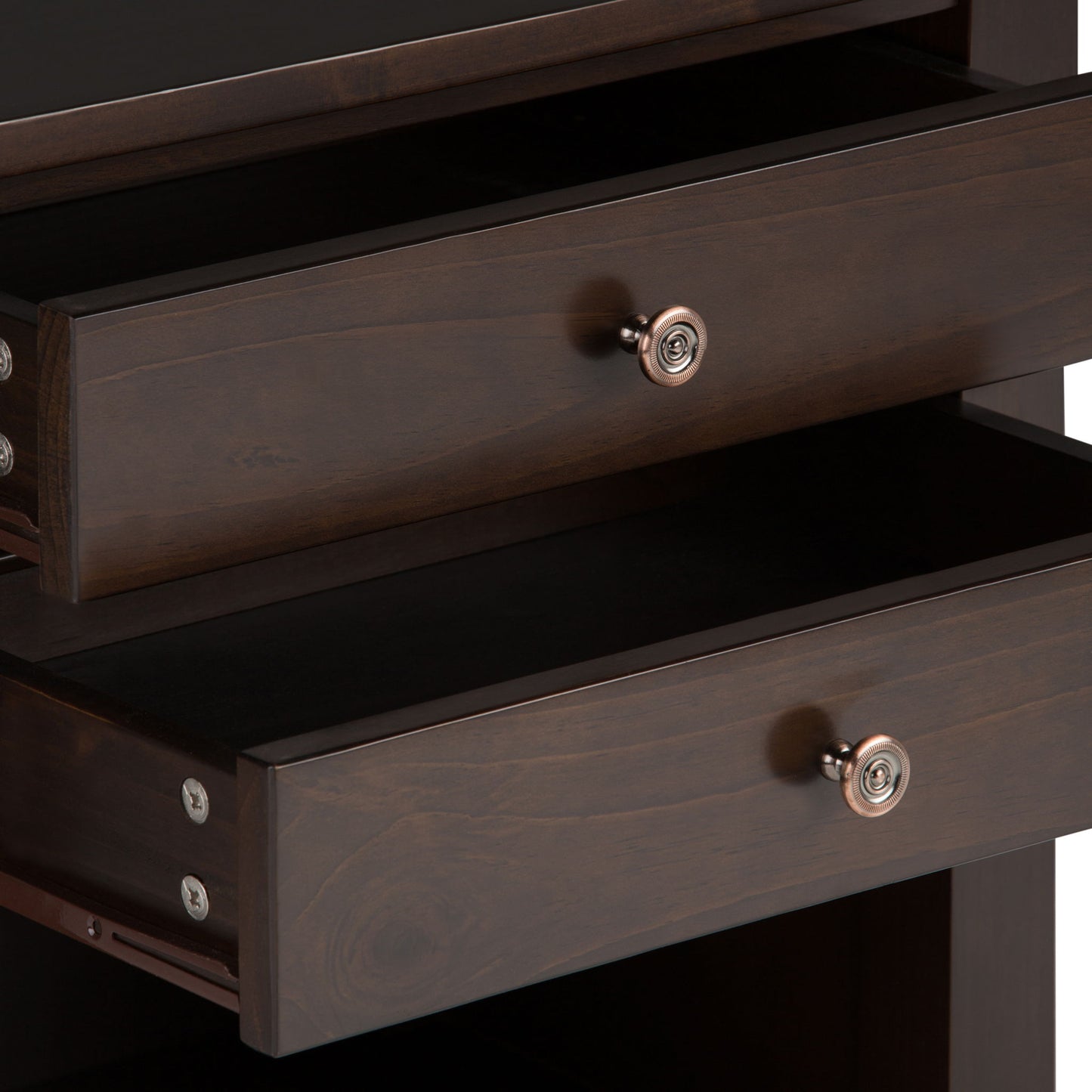 A close-up of two partially open drawers with round metal knobs on the Carlton - Bedside Table, Handcrafted, highlighting detailed wood grain and simple side hardware.