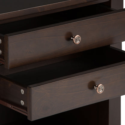 A close-up of two partially open drawers with round metal knobs on the Carlton - Bedside Table, Handcrafted, highlighting detailed wood grain and simple side hardware.
