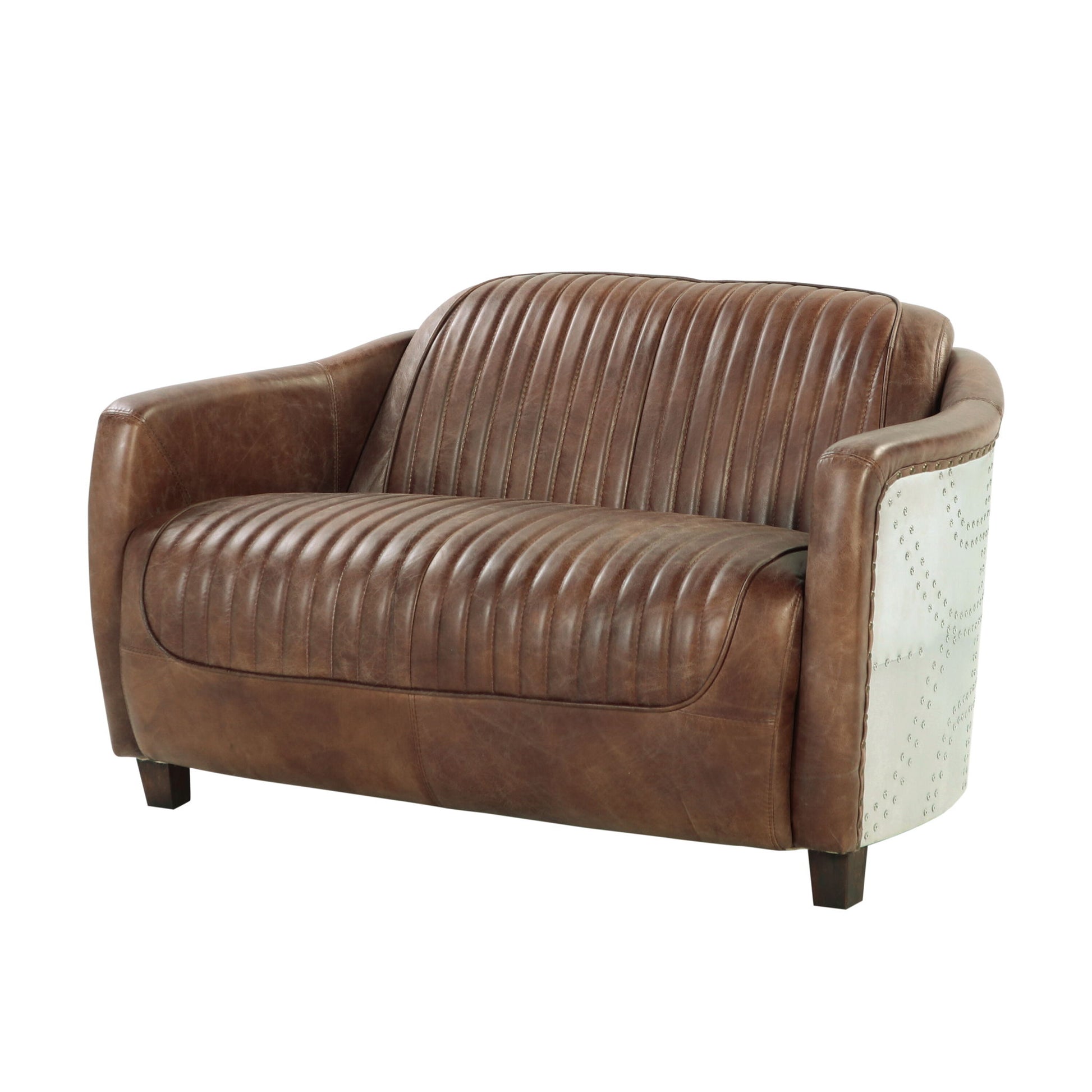 The Brancaster Grain Leather Loveseat in brown features vertical stitching on the seat and backrest, metal stud accents along the sides, and dark wooden legs.