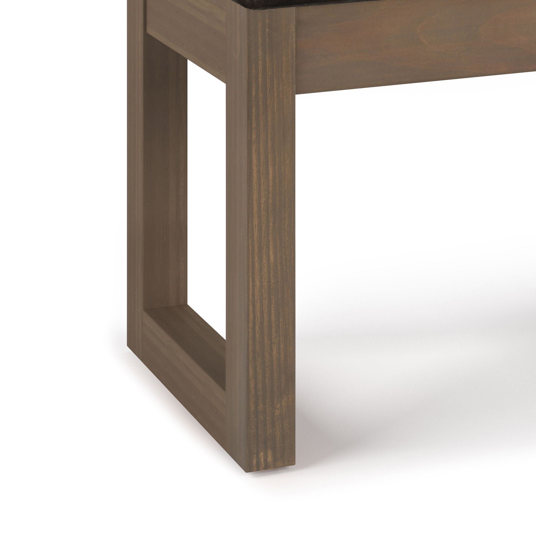 A close-up view of the wooden leg of the Milltown Upholstered Ottoman Bench, featuring a rectangular open-frame design against a white background.