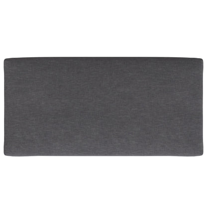 The Rebecca Multifunctional Coffee Table Storage Ottoman features a rectangular, dark gray upholstered cushion or padded panel, shown from above against a white background.