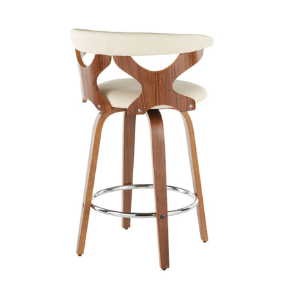 The Gardenia Mid Century Modern Counter Stool (Set of 2) features wooden legs, a round chrome footrest, a curved backrest with cut-out details, and padded cream upholstery on the seat and upper backrest.