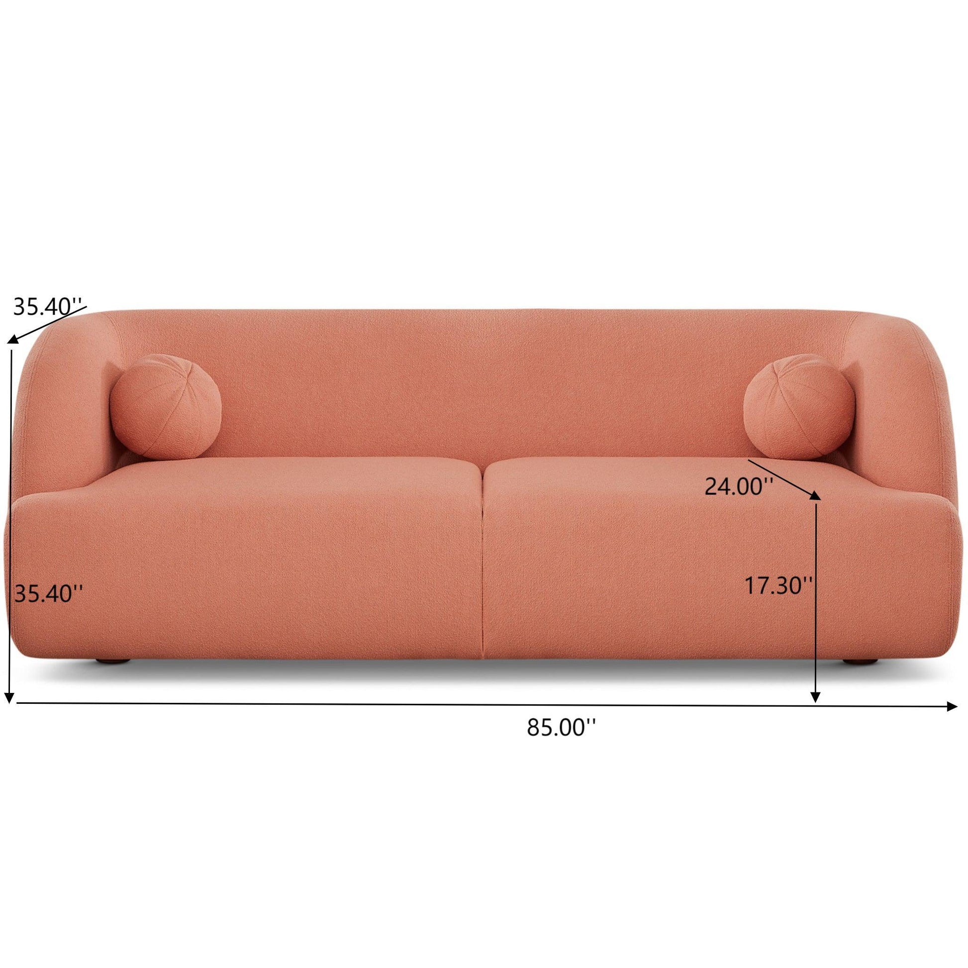 The Anna - French Boucle Sofa is a modern, peach-colored piece with two round cushions, measuring 85" wide, 35.4" high/deep, a seat height of 17.3", and a seat depth of 24".