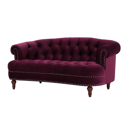 The La Rosa - Victorian Chesterfield Loveseat features plush deep purple velvet, a tufted backrest and seat, rolled arms, nailhead trim, and elegant wooden legs.
