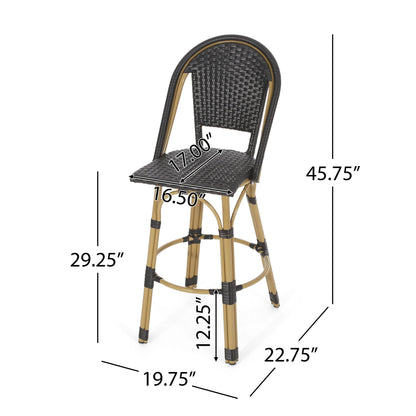 Outdoor Rattan And Aluminum French Barstools (Set of 2) feature woven black seats/backs, light brown legs, and a footrest. Dimensions: seat 17"W x 16.5"D x 29.25"H; total height 45.75"; legs 19.75"W x 22.75"D; footrest at 12.25"H.