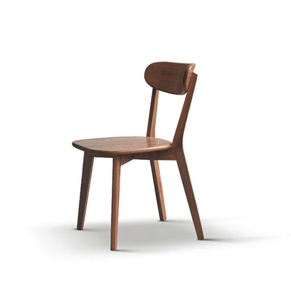 The Simple Dining Chair, Solid Chair Table For Living Room Chair features a curved backrest, angled legs, and a smooth finish with minimalist design, set against a plain white background.