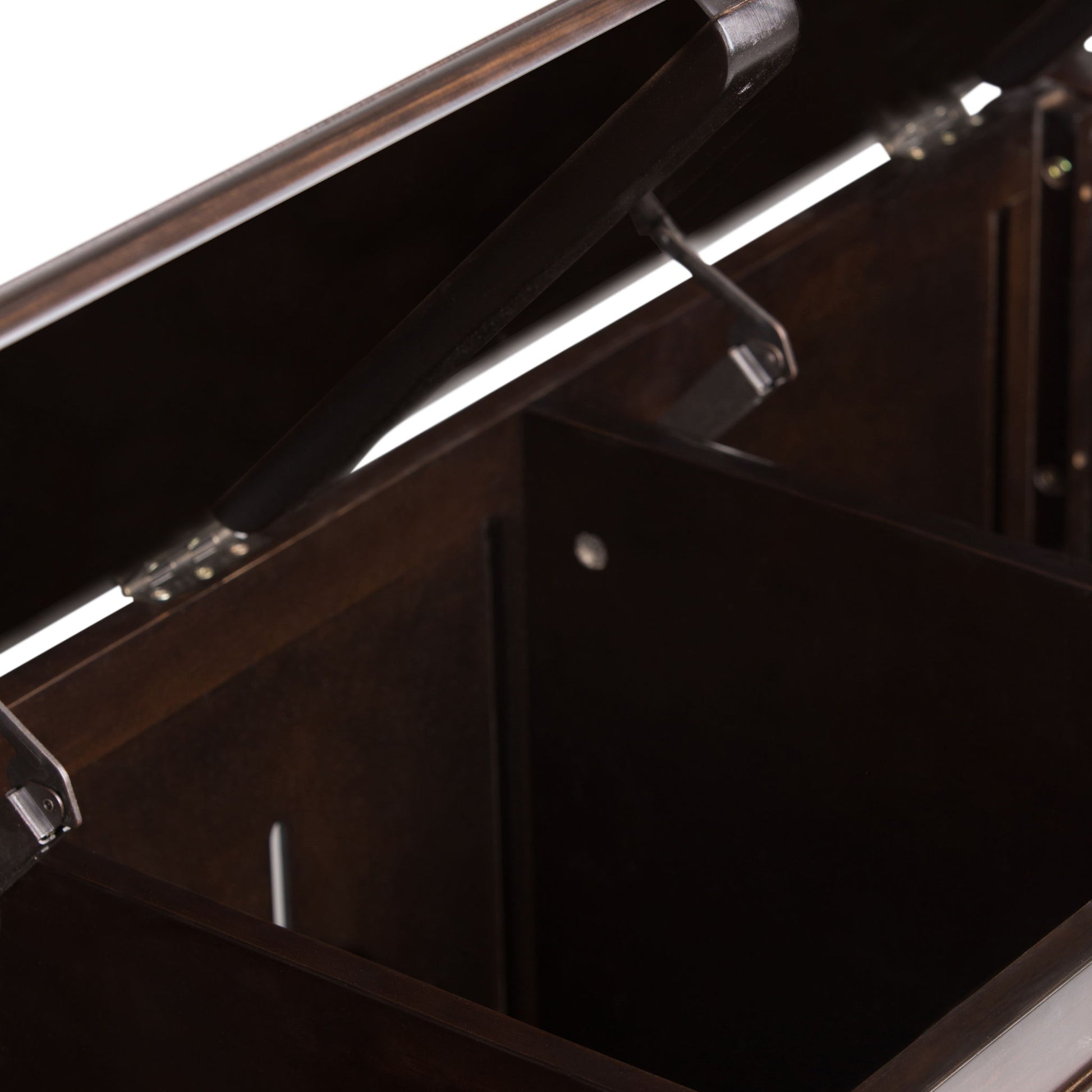 A close-up view of the Connaught Handcrafted Storage Bench Trunk, featuring an open dark wooden chest with a hinged lid and a spacious, compartmentalized interior.