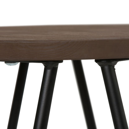 Close-up of the Simeon Multifunctional Metal Stool, featuring a smooth wooden seat and angled black metal legs for a modern look.