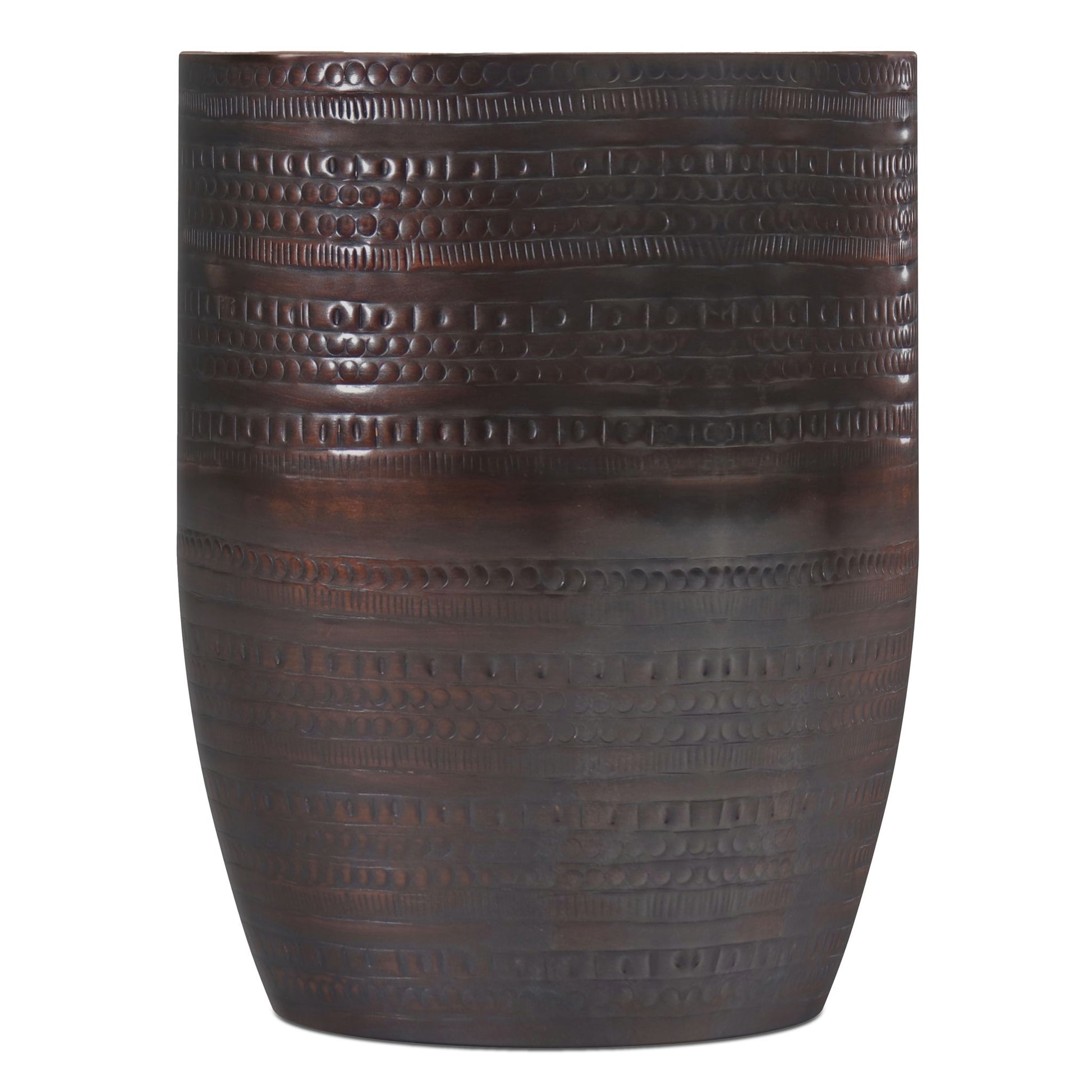 The Johnsen Handcrafted Large Metal Accent Table is dark brown, cylindrical, and features a textured surface with horizontal patterns of raised dots and rectangles.