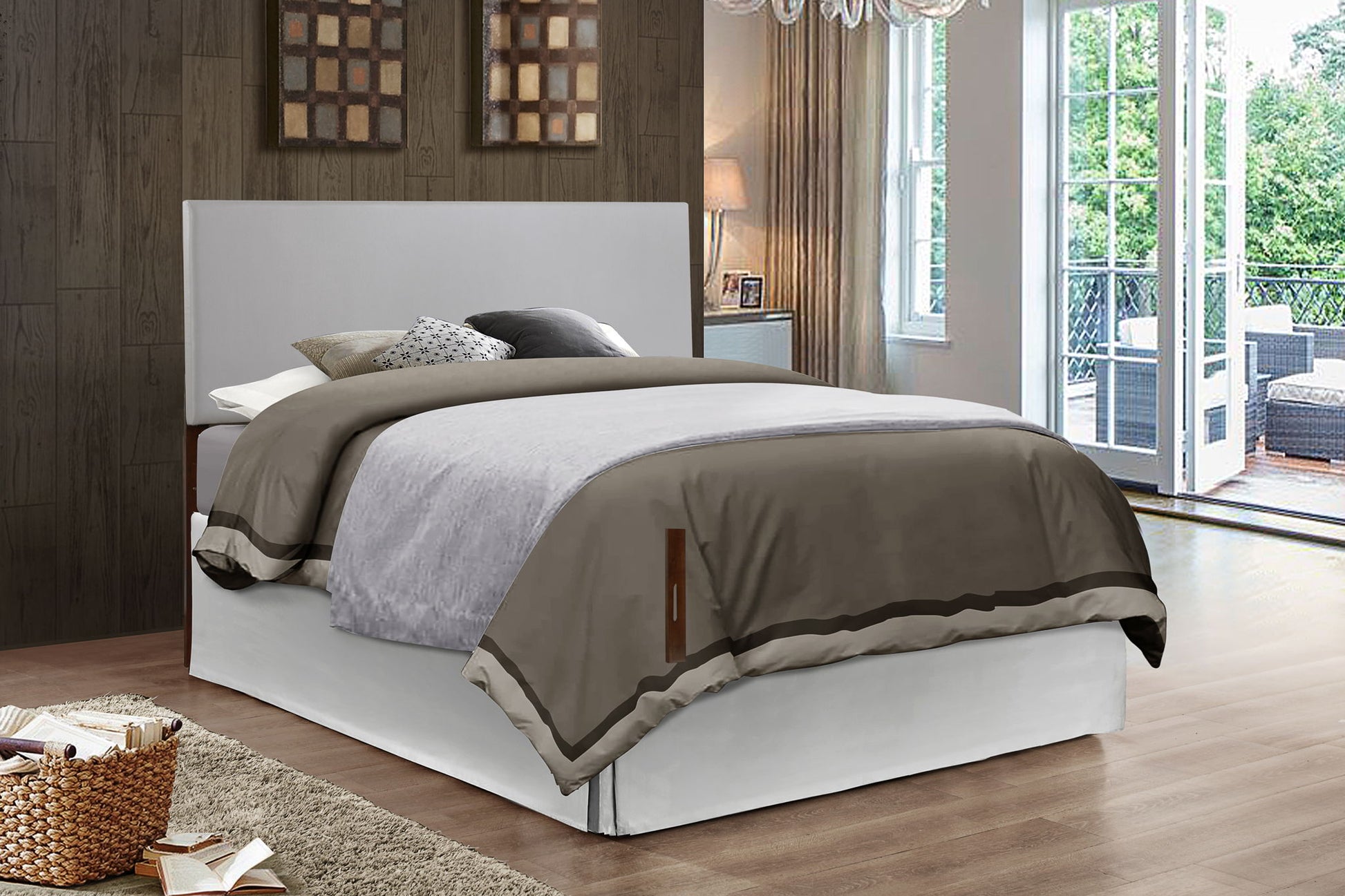 A modern bedroom features the Nova Headboard on a neatly made bed with gray and beige bedding, wood-paneled walls, large windows, a light rug, a basket of books, and patio furniture visible through glass doors.
