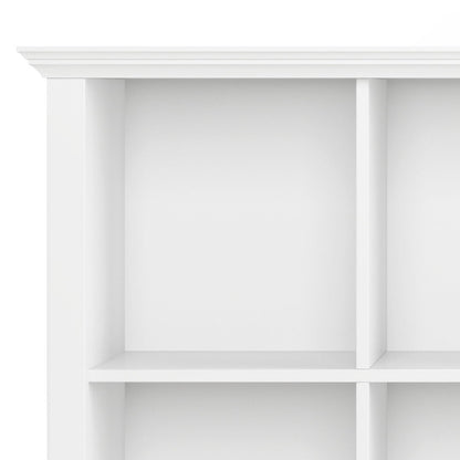 Close-up of the top section of the Acadian - Handcrafted Cube Storage, a white shelving unit with clean lines and a modern design. Four square compartments are visible against a plain white background.