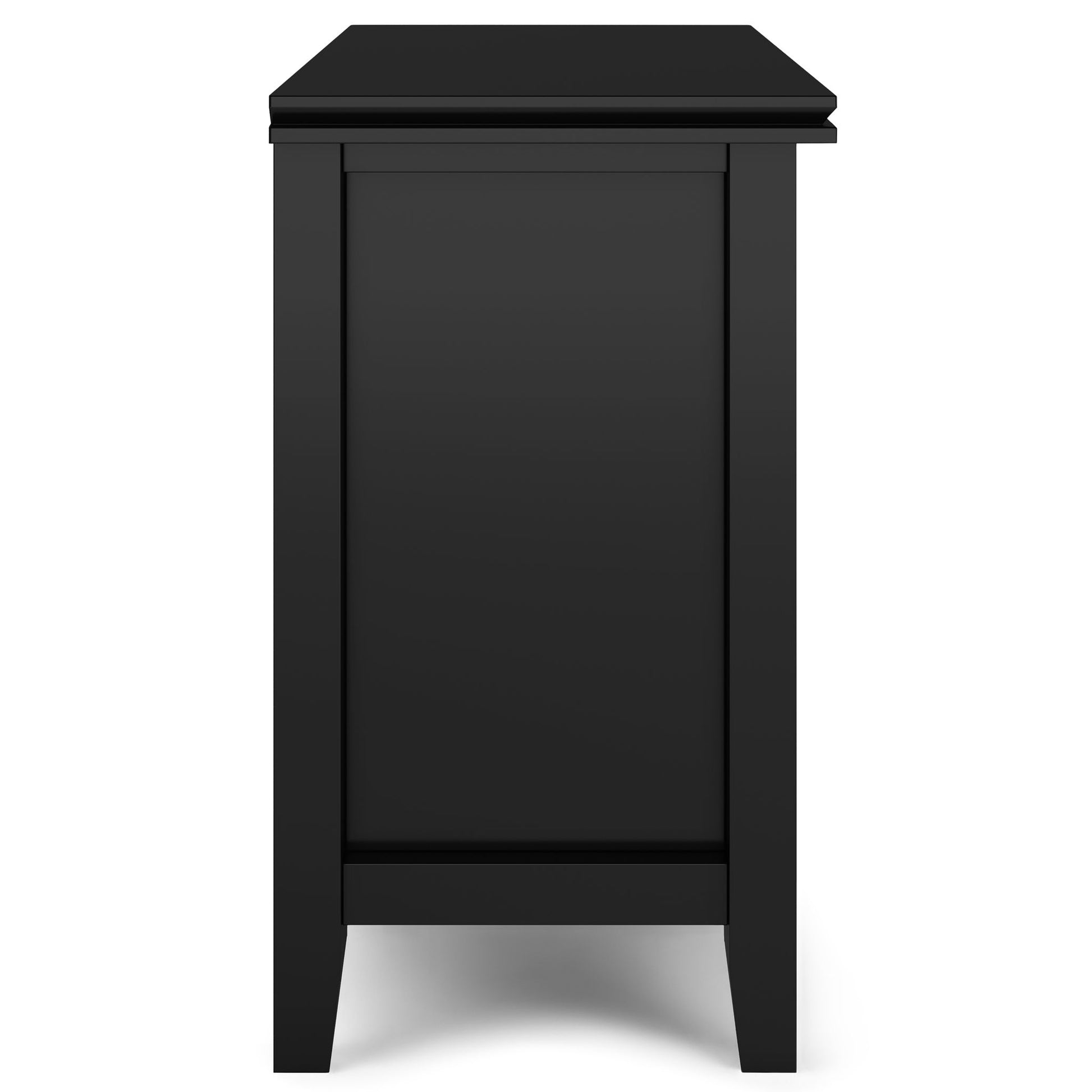 Side view of the Artisan - Handcrafted Bedside Table in black wood, featuring a smooth flat top, clean lines, four legs, and a simple modern design.