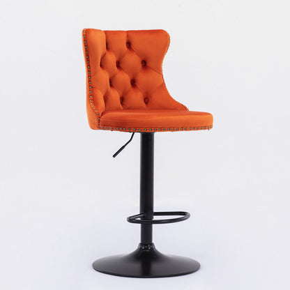 Set of 2 modern Swivel Velvet Barstools with orange tufted upholstery, studded trim, curved backs, adjustable seat height lever, black pedestal base, and footrest—ideal for home pub or kitchen island. Shown against a plain white background.