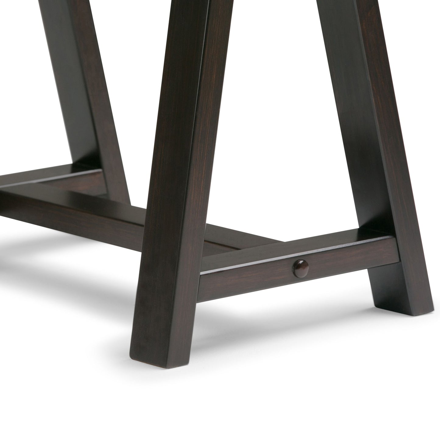 Close-up of the dark wooden legs and crossbar of the Sawhorse - Handcrafted Desk, shown against a white background.