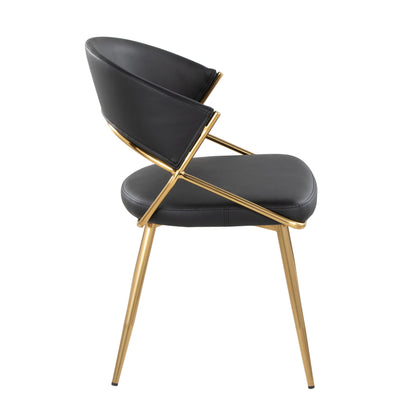 The Jie - Glam Dining Chair (Set of 2) features a black cushioned seat and backrest, sleek gold metal frame, and four angled legs. Shown from the side view against a white background.