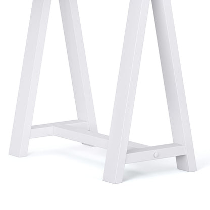Close-up of the white metal legs and support bar of the Sawhorse - Handcrafted Desk, set against a white background.