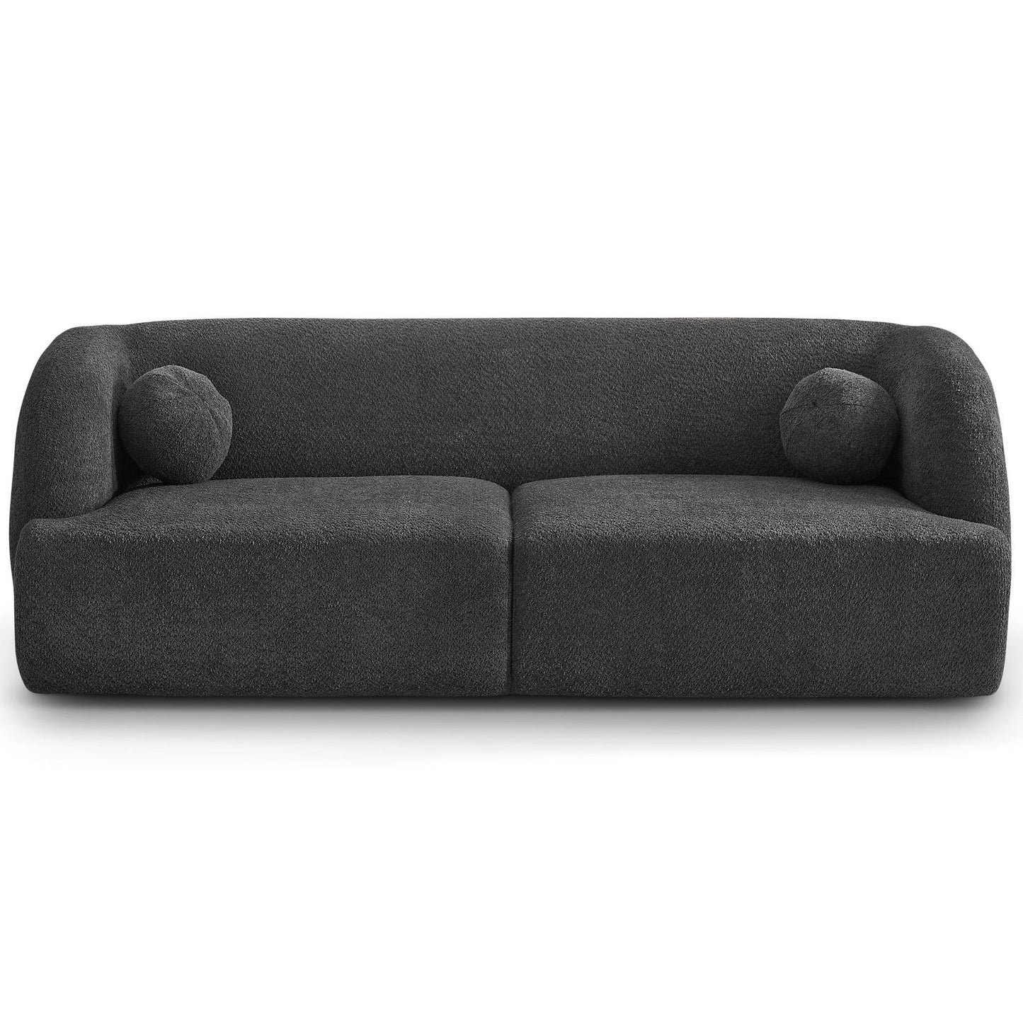 The Anna - French Boucle Sofa is a modern, dark gray piece with textured fabric, rounded edges, and two matching round cushions, photographed against a white background.