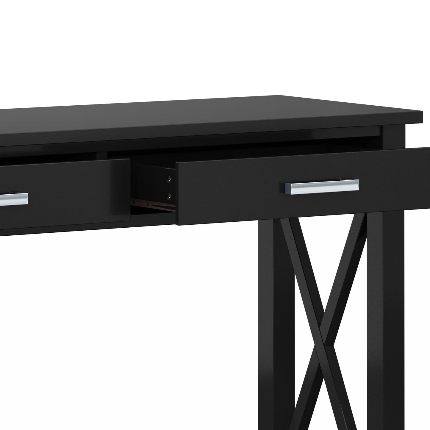 A close-up of the Kitchener - Handcrafted Table, a modern black desk with a partially open center drawer, sleek metal handles, and X-shaped side supports.