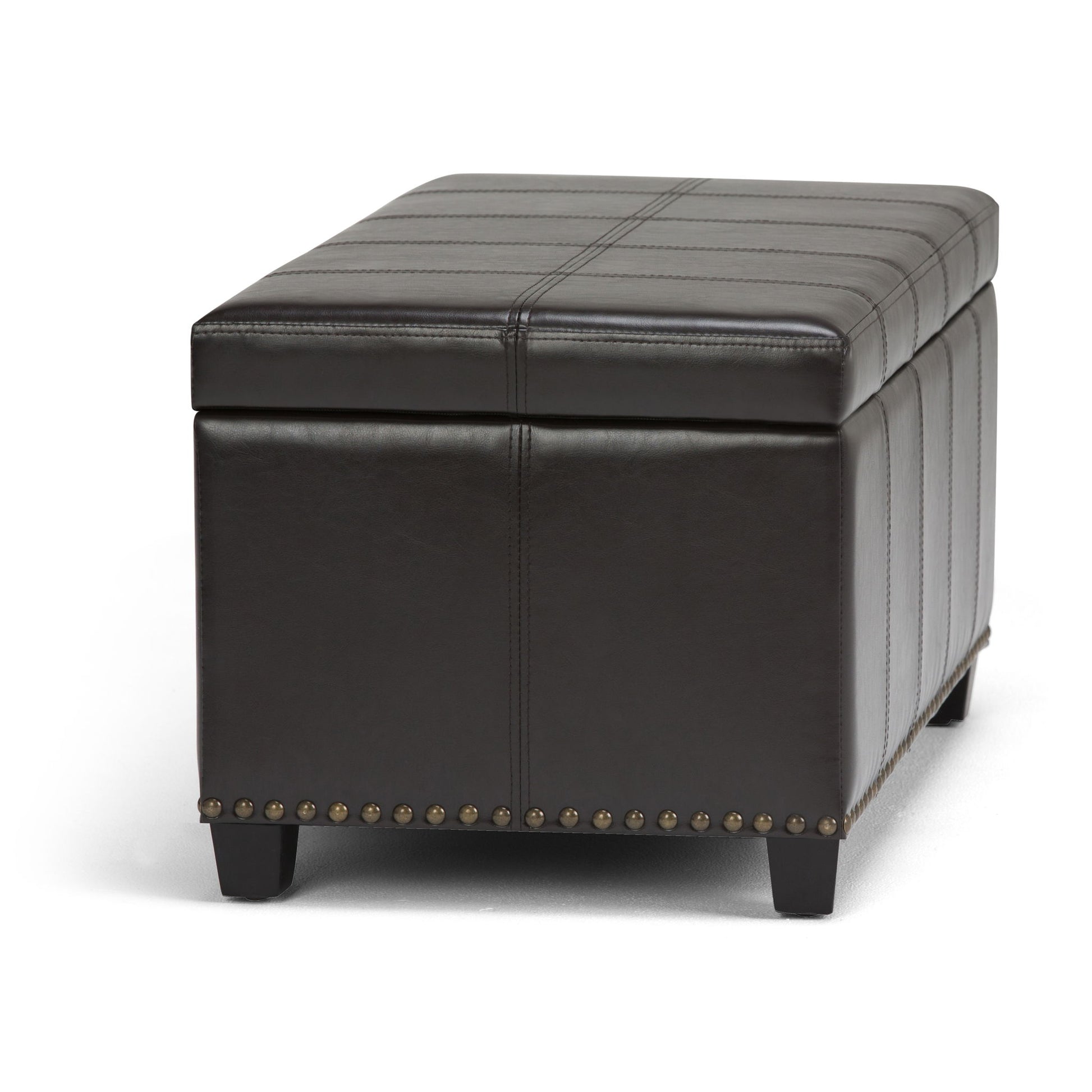 The Amelia Transitional Storage Ottoman Bench features a rectangular dark brown leather design with decorative stitching, metal stud accents along the bottom edge, and short wooden legs.