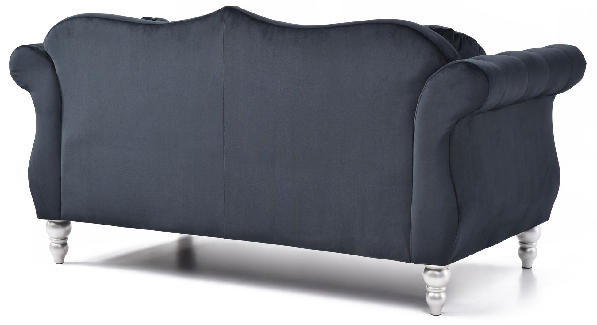 The Stylish Flared Arm Loveseat features dark blue velvet, rolled arms, a curved backrest, and short shiny silver legs, shown from the back against a white background.
