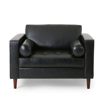 The Sophisticated Club Chair With Relaxing Comfort features a modern black leather design, cylindrical bolster pillows, wooden legs, and a tufted seat cushion, showcased against a plain white background.