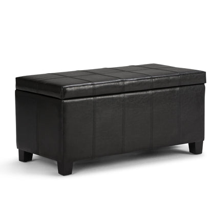 The Dover Upholstered Storage Ottoman Bench is a rectangular black leather bench with a cushioned lid and short legs, designed for seating or storage.