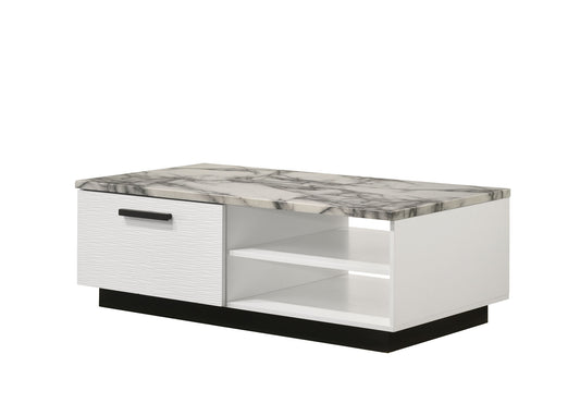 The Matilda Coffee Table features a white faux marble top, a white drawer with a black handle on the left, and two open shelves on the right, all set on a sleek black base.
