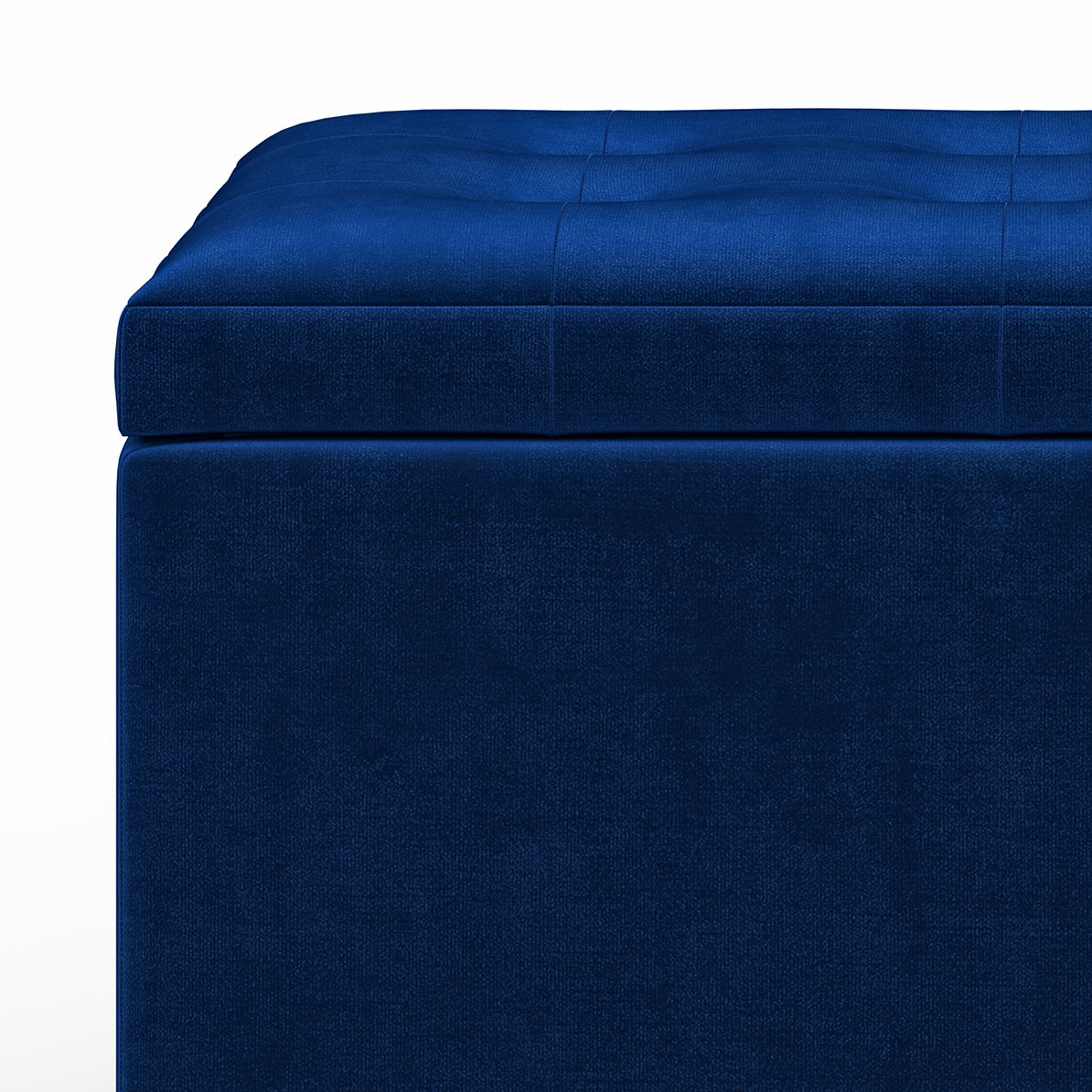 Close-up of the Cosmopolitan Upholstered Storage Ottoman—blue, rectangular, with a tufted cushioned top—set against a white background.
