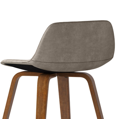 The Randolph Bentwood Counter/Bar Height Stool (Set of 2) features a modern curved gray suede seat and angled wooden legs, shown in a side view against a white background.