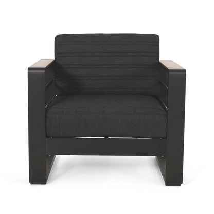 The Giovanna Club Chair Set features a black, boxy, minimalist design with wide flat arms and thick cushions on an aluminum frame, shown from the front against a white background.