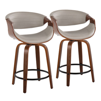 Set of 2 Symphony Mid Century Modern counter stools featuring curved wooden frames, light gray padded seats and backs, swivel design, round black metal footrests, and four wooden legs for a stylish contemporary look.