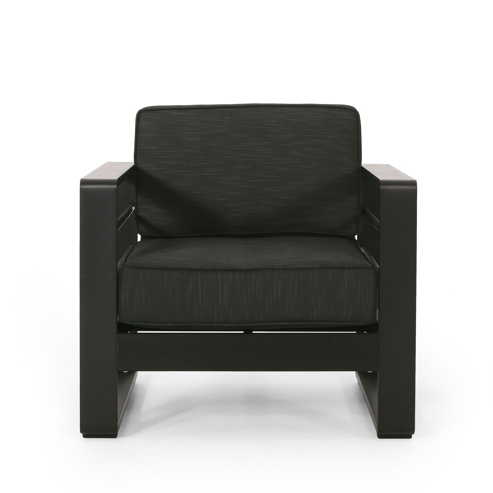 The Maya Bay - Club Chair is a modern black armchair featuring wide armrests, a thick cushioned seat, and a matching cushioned backrest, displayed against a white background.