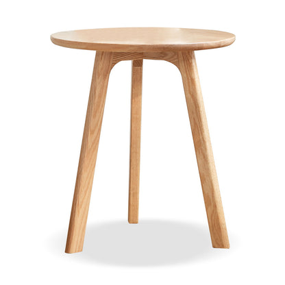 The Round Small End Table, a light wood side table with three splayed legs, is shown against a plain white background—ideal for bedrooms and balconies.