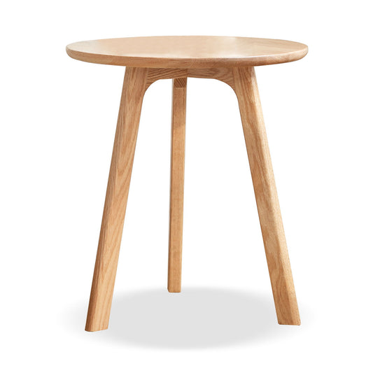 The Round Small End Table, a light wood side table with three splayed legs, is shown against a plain white background—ideal for bedrooms and balconies.