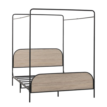 The Modern Canopy Bed Frame features black metal posts and light wood panels on the headboard and footboard, displayed on a white background. It includes slats for mattress support.