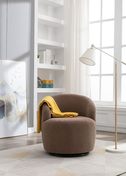 A Teddy Fabric Swivel Accent Armchair Barrel Chair with a yellow blanket sits by a tall floor lamp in a bright modern room featuring white shelves, large windows, and framed artwork on the floor.