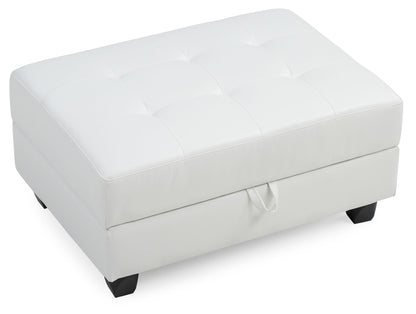 The Stylish Storage Contemporary Ottoman is a rectangular, white tufted piece with short black legs, a small fabric handle on one side, smooth upholstered surface, and subtle top stitching.