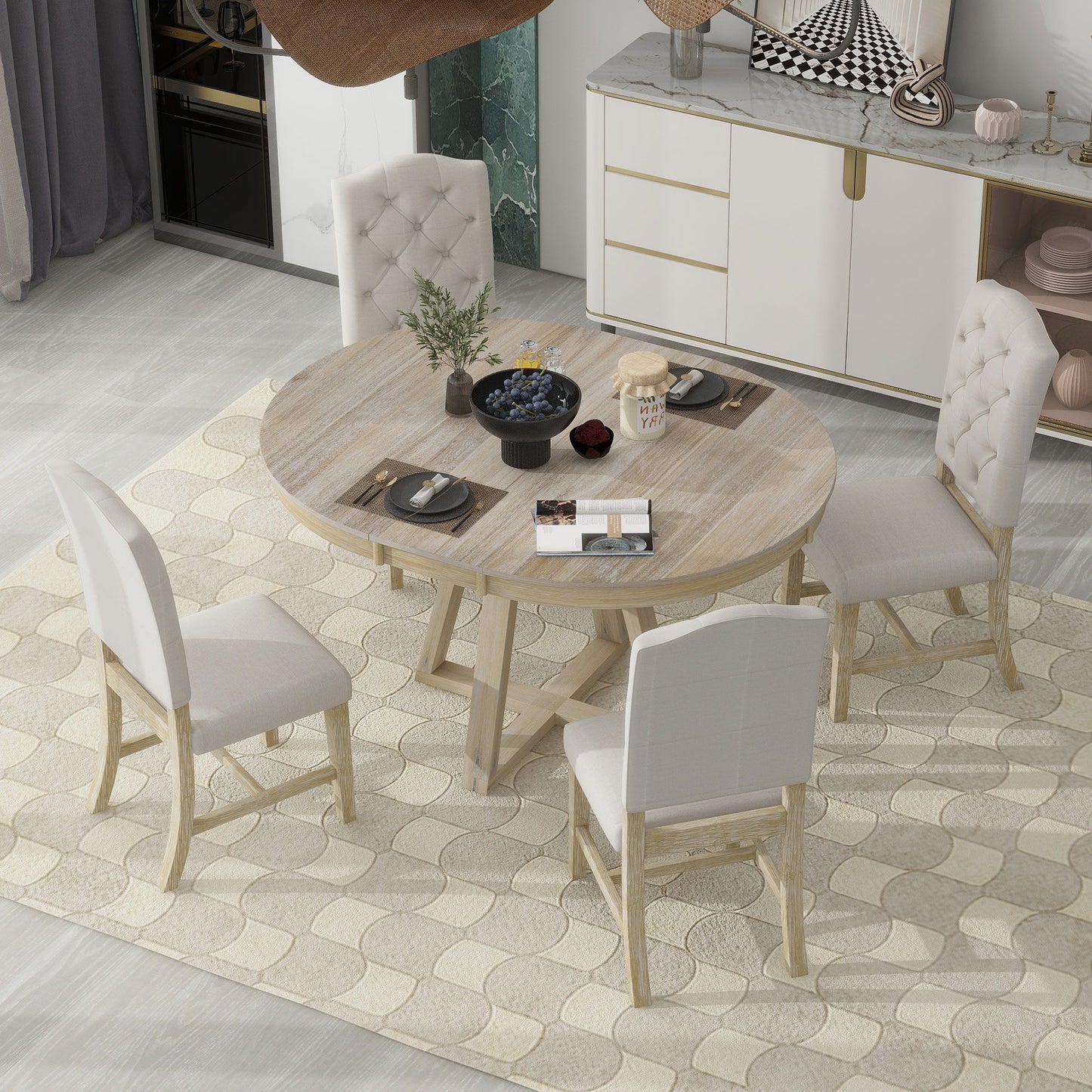 The Retro Functional Dining Set features a round table with leaf and four white upholstered chairs, shown on a patterned beige rug in a modern dining room with a sideboard and decorative accents.