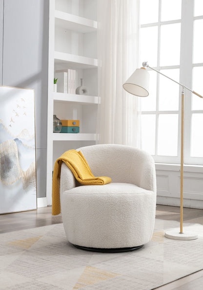 A Teddy Fabric Swivel Accent Armchair Barrel Chair with powder coating metal ring, draped with a yellow blanket, sits on a light-patterned rug near a tall window, beside a floor lamp and bookshelf in a bright, airy room.