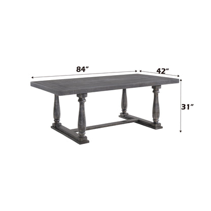 The Bernard - Weathered Dining Table is rectangular with ornate legs, measuring 84"L x 42"W x 31"H. It features a dark, weathered finish and sturdy construction.