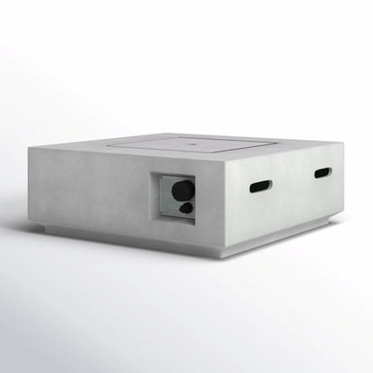 The Reinforced - Propane / Gas Fire Pit Table is a square, modern concrete fire pit with clean lines, control knobs on one side, and rectangular vents on two sides, shown against a plain white background.