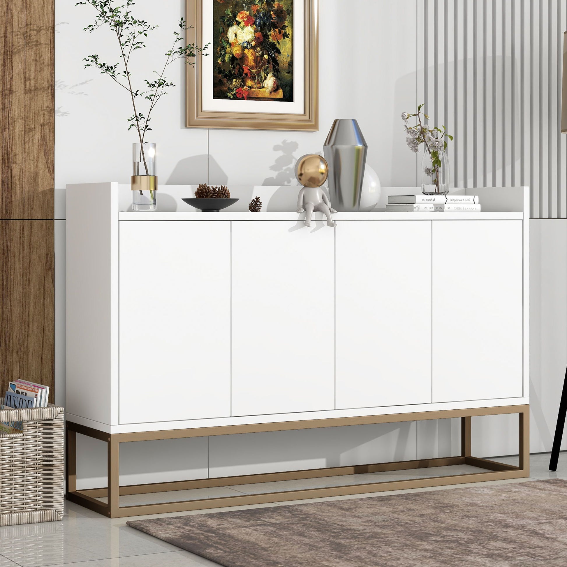 The Modern Sideboard Elegant Buffet Cabinet With Large Storage Space for Dining Room or Entryway stands by the wall, topped with vases, a plant, a figurine, and books. Framed art hangs above; a basket rests on the floor nearby.