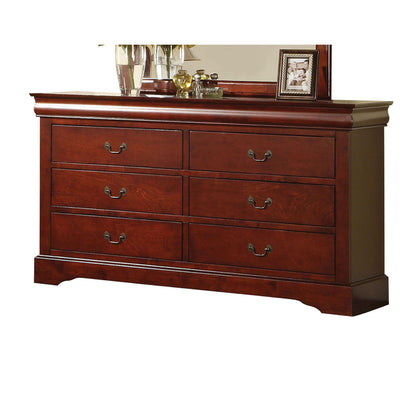 The Louis Philippe III Dresser boasts durable construction, a cherry finish, six drawers with metal handles, and elegant trim. It’s topped with a framed photo, glass vases, decorative items, and a partially visible mirror behind them.