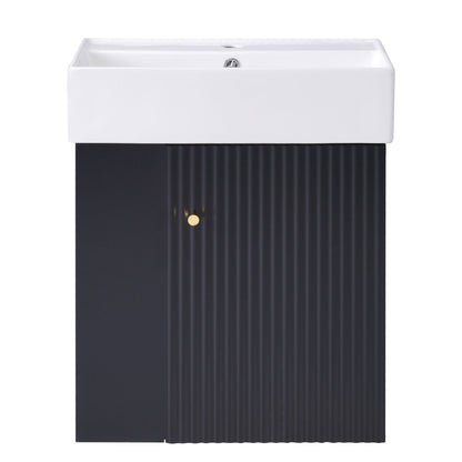 The Modern Floating Bathroom Vanity With Ceramic Basin features a white rectangular sink atop a black grooved cabinet with a small round gold-colored knob, perfect for small bathrooms.