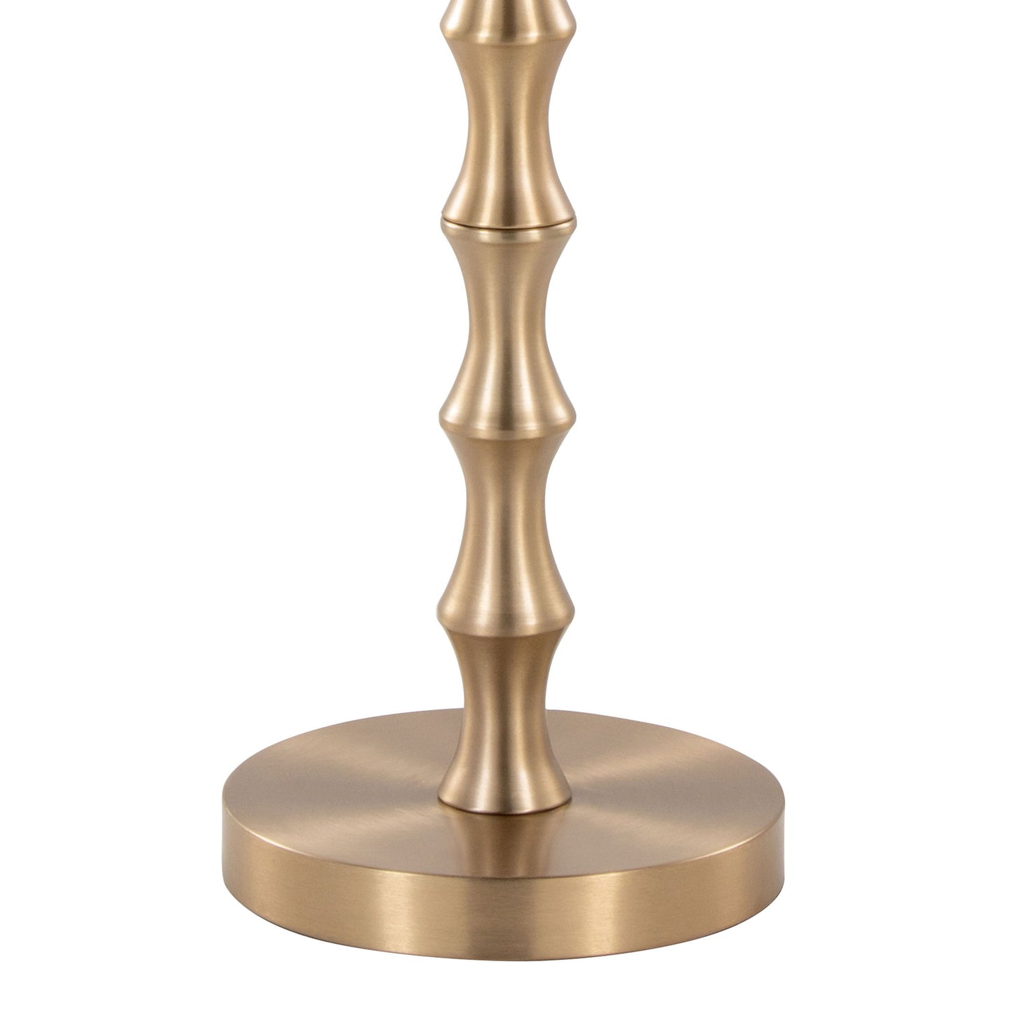 The Bora - Contemporary Table features a metallic base with a brushed gold finish and rounded, ribbed accents inspired by bamboo, resting on a circular platform.