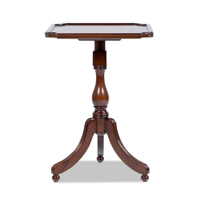 The Mabel – Elegant Turned Pedestal Side Table in rich walnut birch features a small, square tray-style top, traditional turned pedestal center, and three curved legs with round feet for an elegant, classic look.