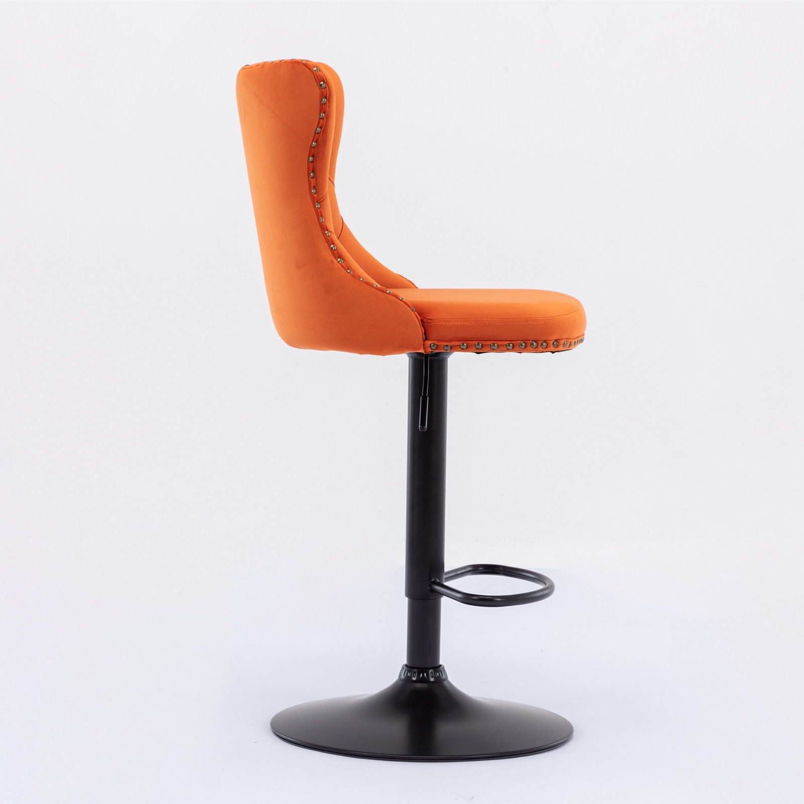 The Swivel Velvet Barstools, a set of 2 modern upholstered stools with orange tufted seats, black metal pedestal bases, backs, and footrests, are shown in profile against a plain white background.